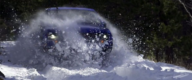 Watch the Ford F-150 SVT Raptor Crash through a Wall of Snow