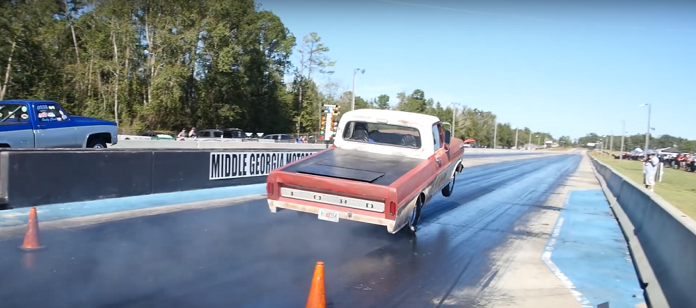 f150online.com Nitrous-Pumping Ford F-100 Pops a Wheelie Off the Line