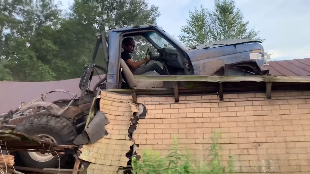 f150online.com Wild F-350 Owner Drives Onto the Roof of an Old Barn