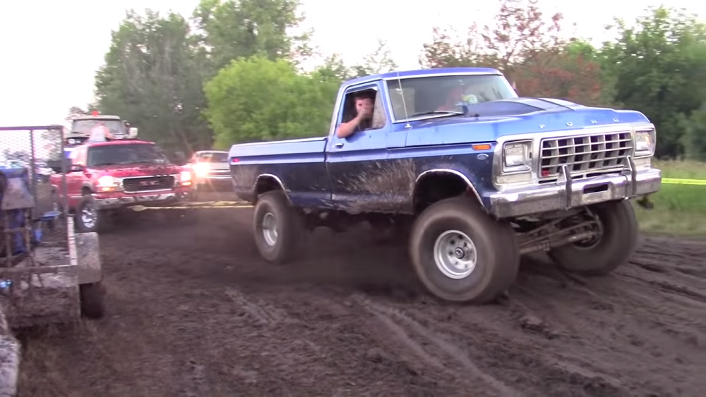 f150online.com Classic Ford Truck Rescues a Modern GMC...That's Towing a Jeep
