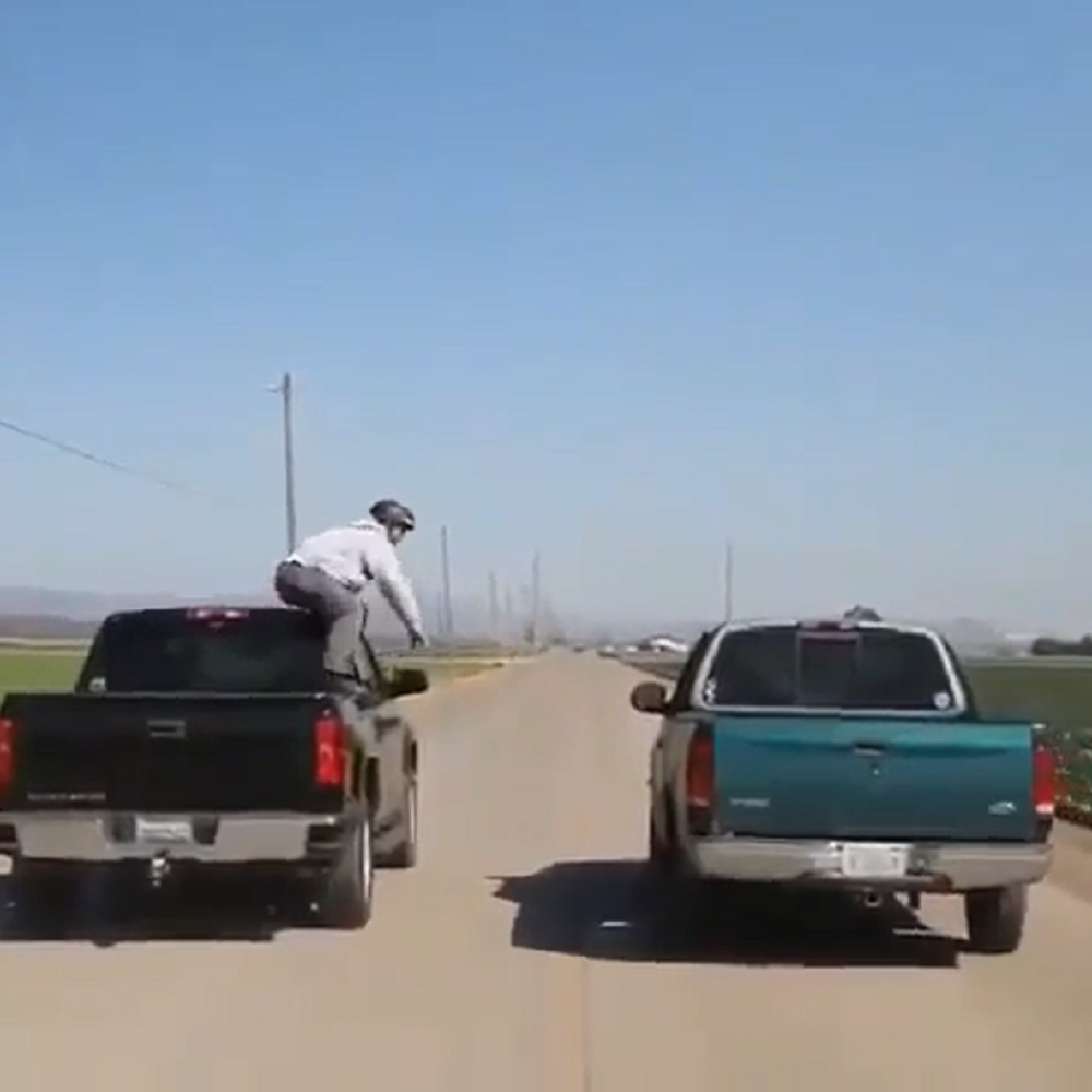 f150online.com Daredevil Leaps Into the Bed of a Moving Ford F-150