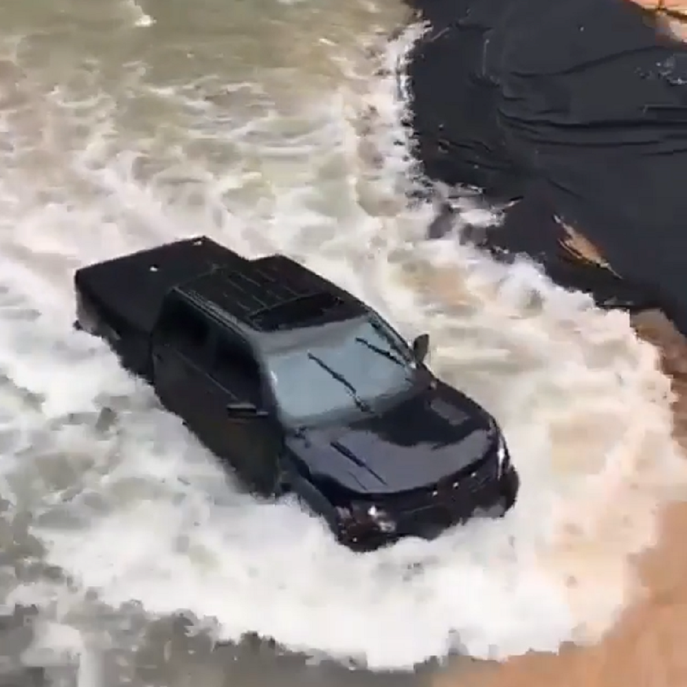 f150online.com Ford F-150 Raptor Doesn't Let a Deep Stream Slow It Down