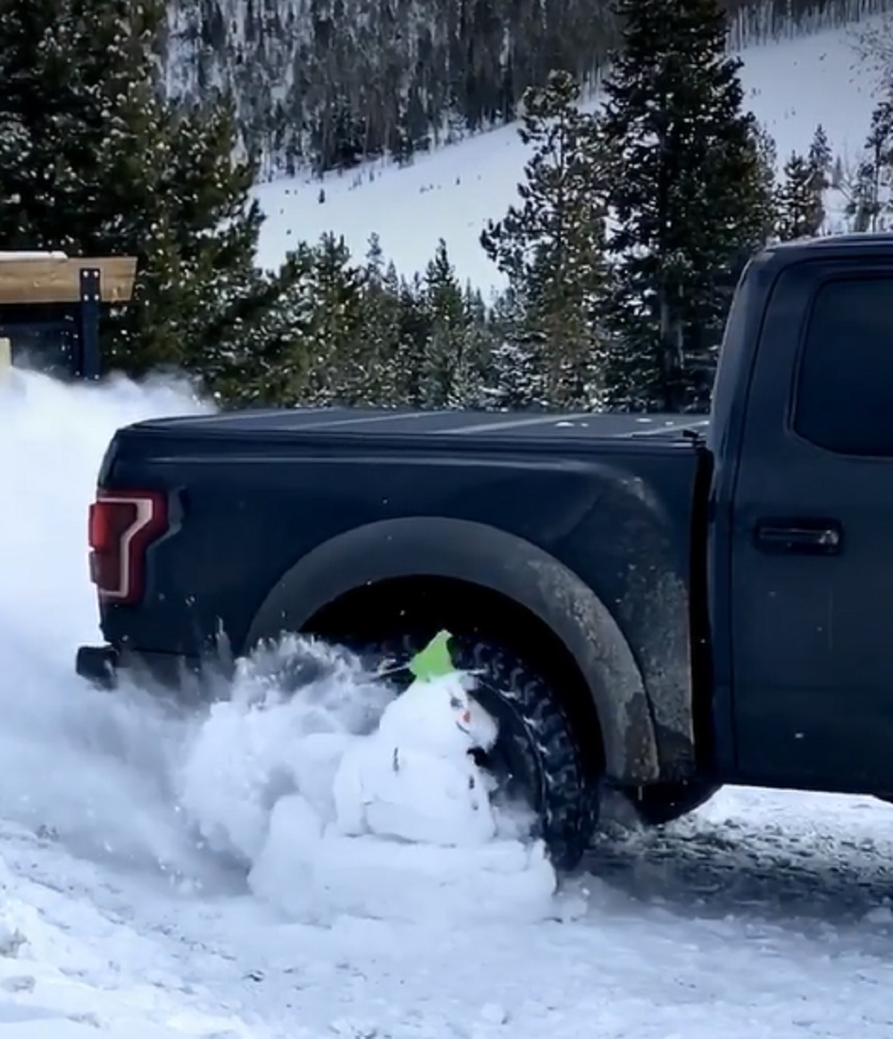 f150online.com Ford F-150 Raptor is a Power-Sliding Snowman Assassin