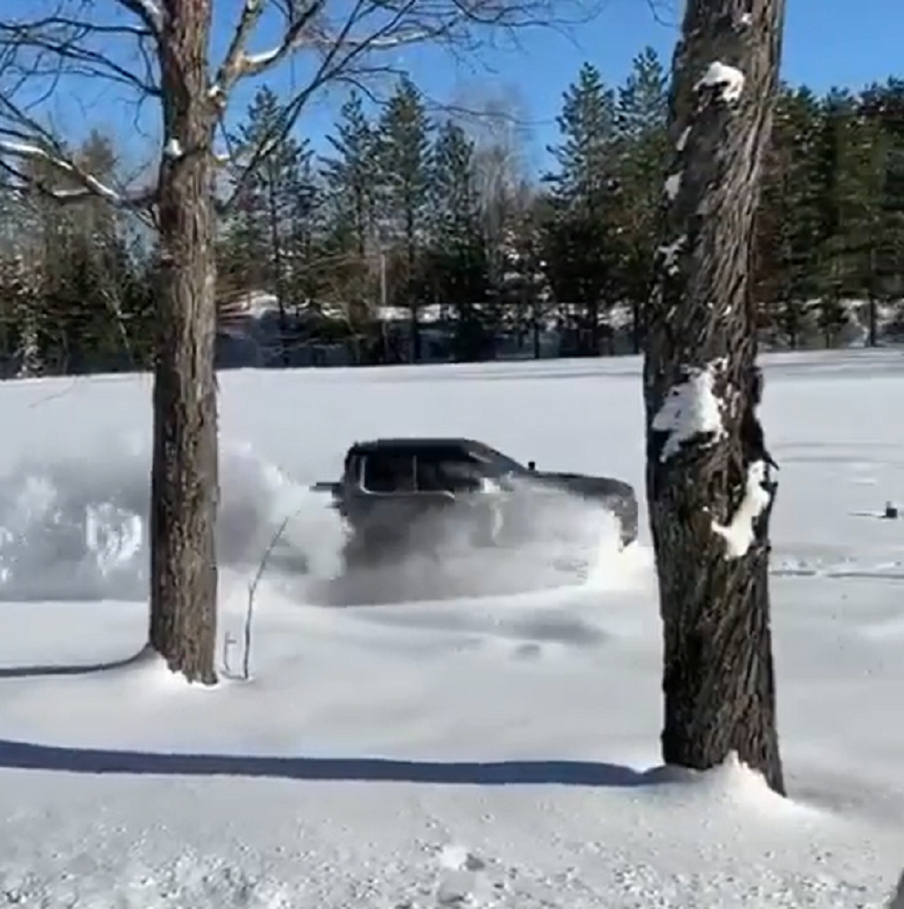 f150online.com Ford Raptor Makes Its Own Shortcut Through Deep Snow
