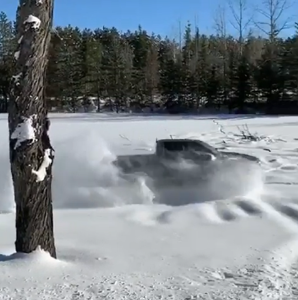 f150online.com Ford Raptor Makes Its Own Shortcut Through Deep Snow