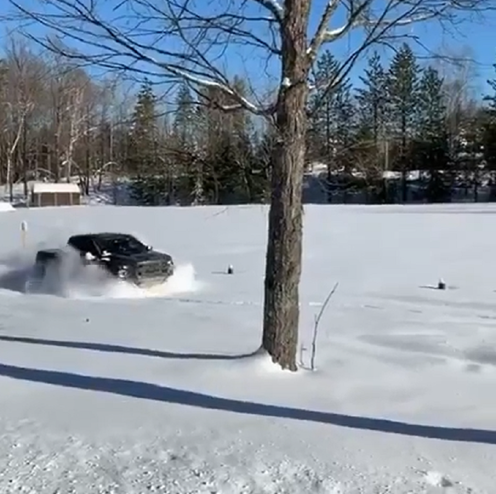 f150online.com Ford Raptor Makes Its Own Shortcut Through Deep Snow