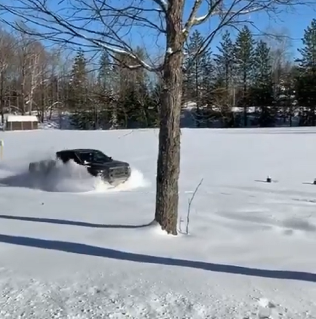 f150online.com Ford Raptor Makes Its Own Shortcut Through Deep Snow