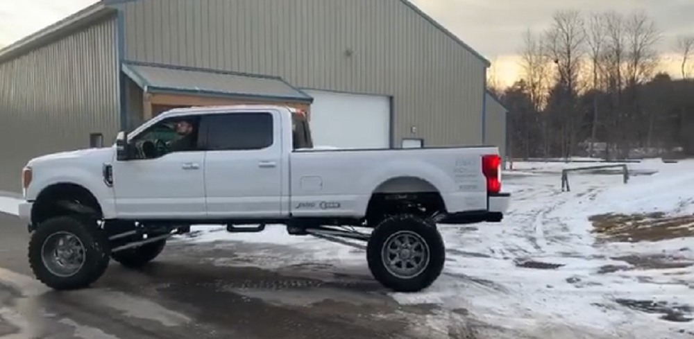 f150online.com Super Duty with Air Suspension Makes Loading a Snowmobile Easy