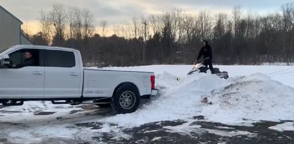 f150online.com Super Duty with Air Suspension Makes Loading a Snowmobile Easy