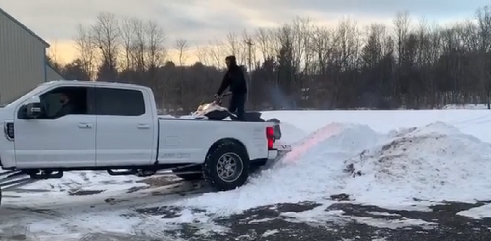 f150online.com Super Duty with Air Suspension Makes Loading a Snowmobile Easy
