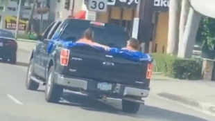 f150online.com Buddies Take Refreshing Dip in Back of Moving F-150